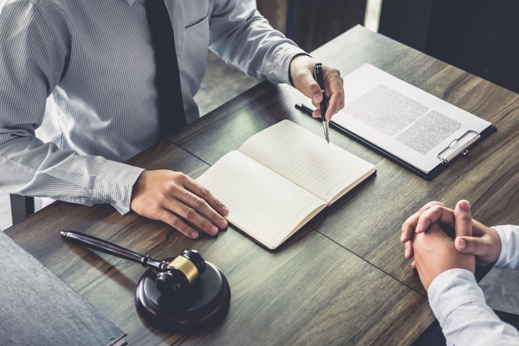 A lawyer talking to a client in the office