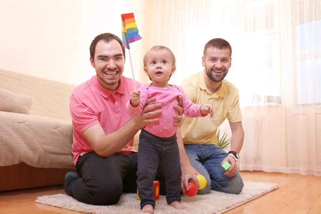 same sex couple adopted a child