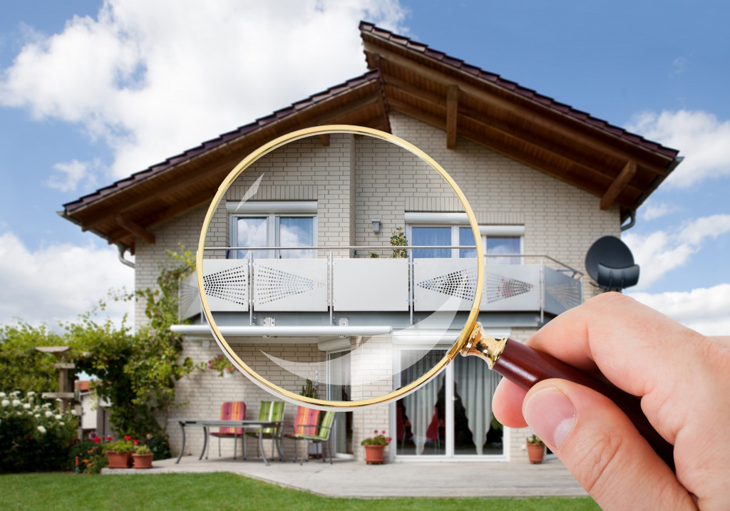 home inspection with magnifying glass
